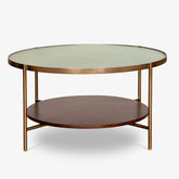 Mira Coffee Table with glass top, walnut-finished wood, and brass legs, ideal as a modern center table or tea table for living room decor.